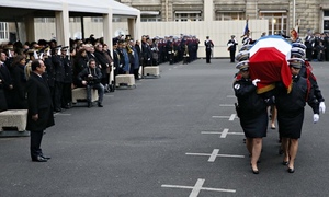 Francois Hollande pays tribute to the police officers killed in the recent attacks