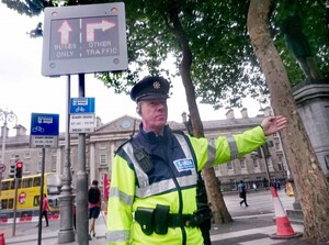 10/08/2015 Luas Cross City. Traffic restrictions kicked in this morning for works on the Luas Cross City service. Pictured, a Traffic Corps Garda on College Green directs traffic through the area. Photograph: Mark Stedman / Rolling News
