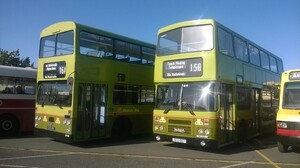 Two Green Dublin buses