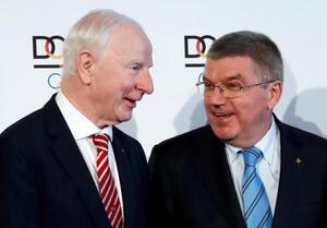 European Olympic Committee (EOC) President Patrick Hickey (L) and International Olympic Committee President (IOC) Thomas Bach (C) arrive for a ceremony in Frankfurt, Germany, May 20, 2016. REUTERS/Kai Pfaffenbach/Files