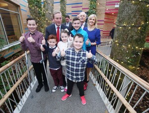NO REPRO FEE 09/12/2016 Pictured at Barretstown Castle in Co. Kildare today were An Taoiseach, Enda Kenny T.D., Maurice Pratt, Chair of Barretstown and Dee Ahearn, CEO Barretstown with Ben MacHugh (14, blue jacket), his brothers David (12, left) and Patrick (9, front), and Cillian McDonnell (9, 2nd from left) and his sister Cliodhna (10), as An Taoiseach, Enda Kenny T.D. officially opened the new Dining Hall at Barretstown, the charity for seriously ill children. ‘Elizabeth's Tree House', the new 'heart' of the camp is specifically designed to meet the needs of campers, providing a combination of excitement and tranquillity inside its modern tree house design. Photograph: Leon Farrell / Photocall Ireland