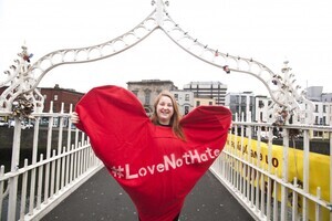 20/1/2017. Donald Trump banners. Pictured is Siona Cahil from Union Students of Ireland at the Hapenny Bridge in Dublin. Today Donald Trump’s Presidential inauguration was marked by the dropping of a banner from the Ha’penny bridge which reads “BRIDGES NOT WALLS – Love Trumps Hate. The events is one of scores of similar events across 3 continents in solidarity with people in the US who are likely to be the targets of the hate which has become associated with the Trump campaign.The action is coordinated by the European Network Against Racism Ireland (ENAR Ireland) and is supported by the Immigrant Council of Ireland, The Union of Students in Ireland (USI), the Migrant Rights Centre Ireland (MRCI) and other ENAR Ireland network members. Photo:Leah Farrell/RollingNews.ie